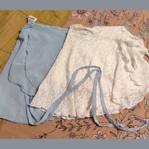 Two short demi skirts.